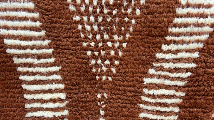 Handmade round Berber wool rug in brown and white Moroccan pattern