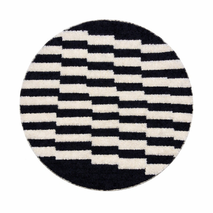 Round black and white Moroccan wool rug with handmade Berber geometric pattern on a clean white background