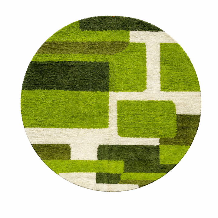 Shop a handmade round green Moroccan wool rug featuring a modern abstract geometric design. Soft, unique, and perfect for stylish contemporary interiors.