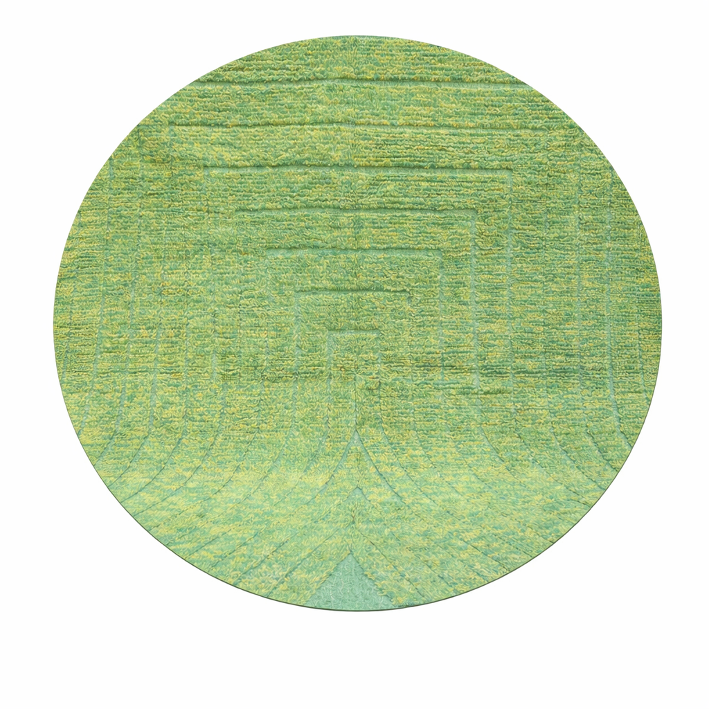 Round handmade Moroccan wool rug in soft sage green tones