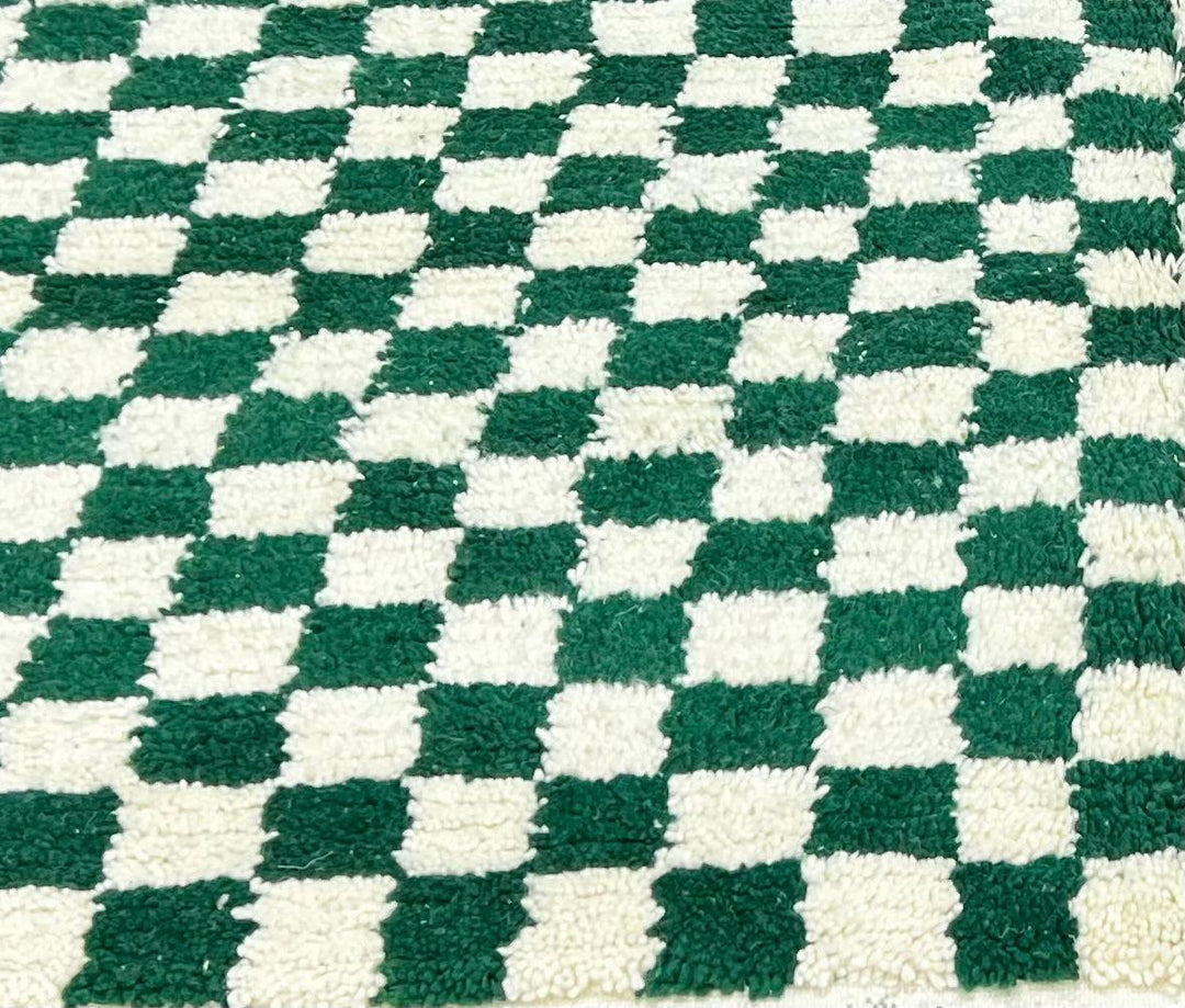 Round green and white checkered Moroccan wool rug
