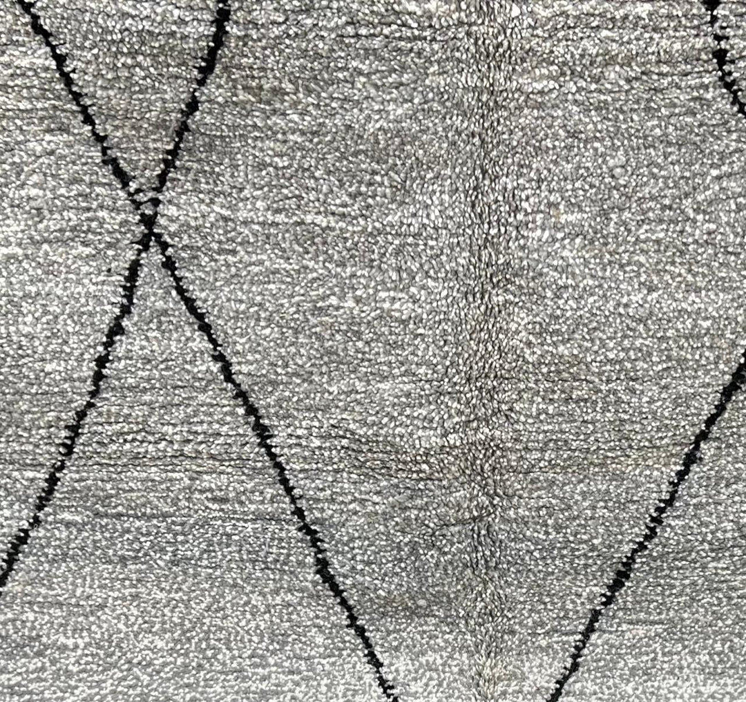 Round grey Moroccan wool rug with minimalist black diamond Beni Ourain lines handmade by Berber artisans