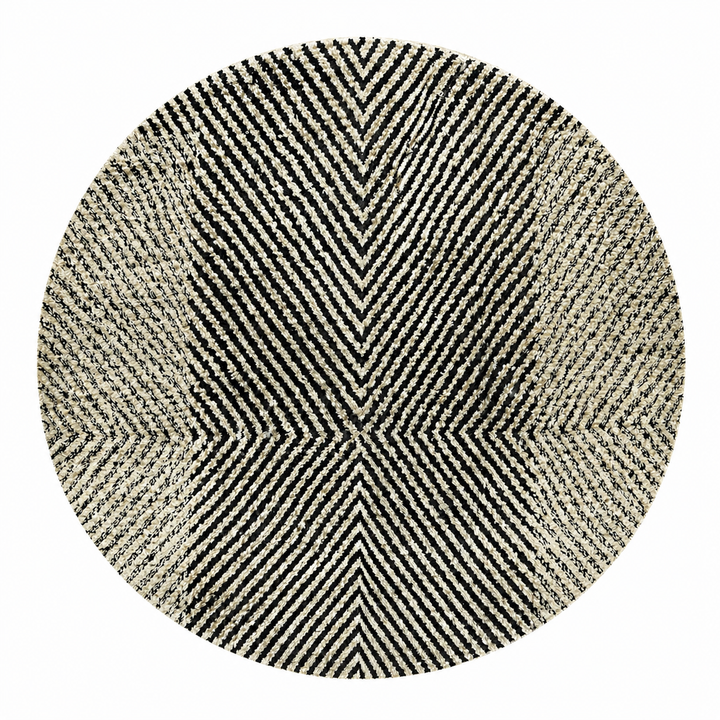 Handmade round Moroccan Berber rug in black and white with symmetrical tribal design