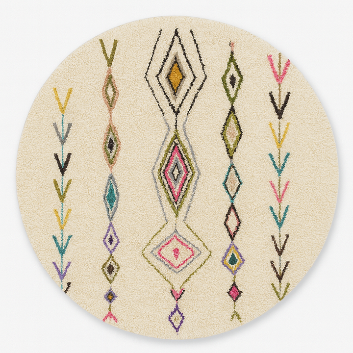 Round Moroccan Berber rug with white wool base and colorful tribal diamond motifs, handmade wool carpet