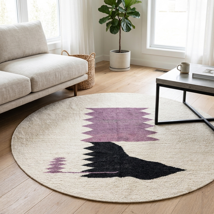 Handmade round Moroccan kilim rug with flatweave design, featuring an white wool base with abstract purple zigzag and black geometric motif.