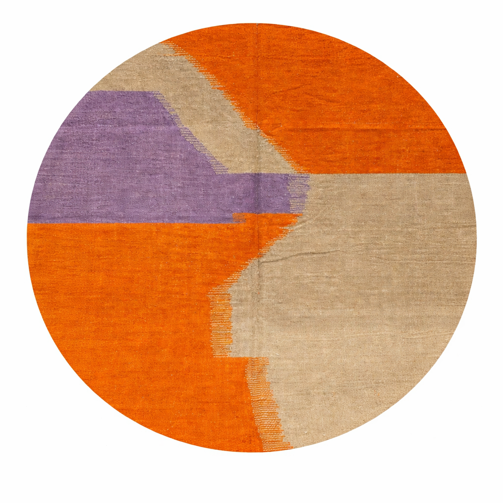 Handmade round Moroccan kilim rug with flatweave construction, featuring abstract earth tones in burnt orange, beige, and muted lavender.
