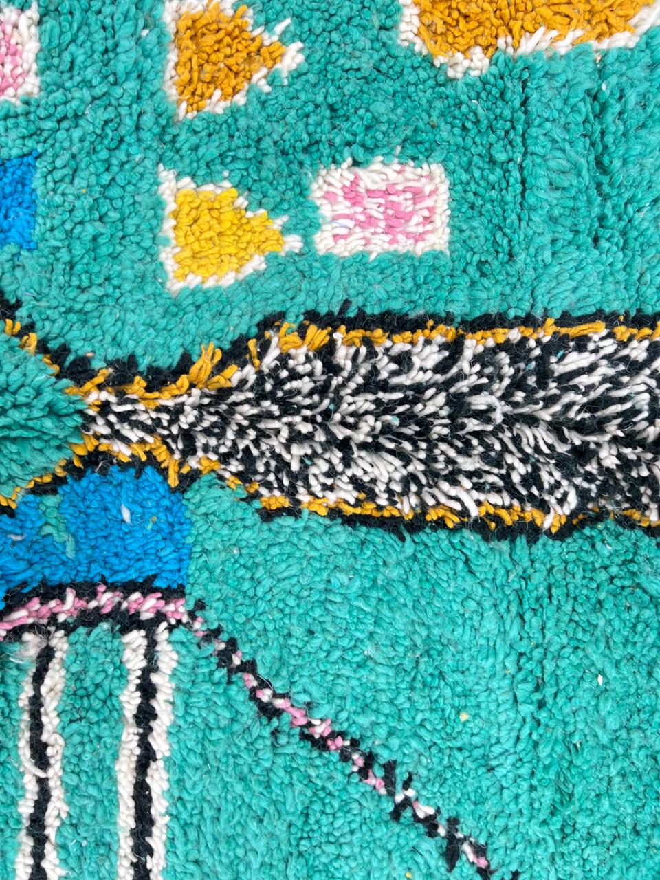 Handmade turquoise Moroccan round rug with modern abstract Berber design