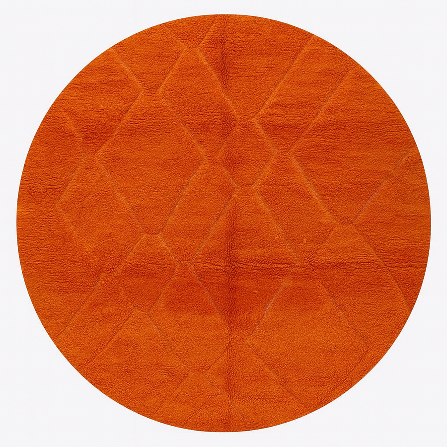 Round Moroccan rug in vibrant orange wool with carved diamond geometric pattern, handmade