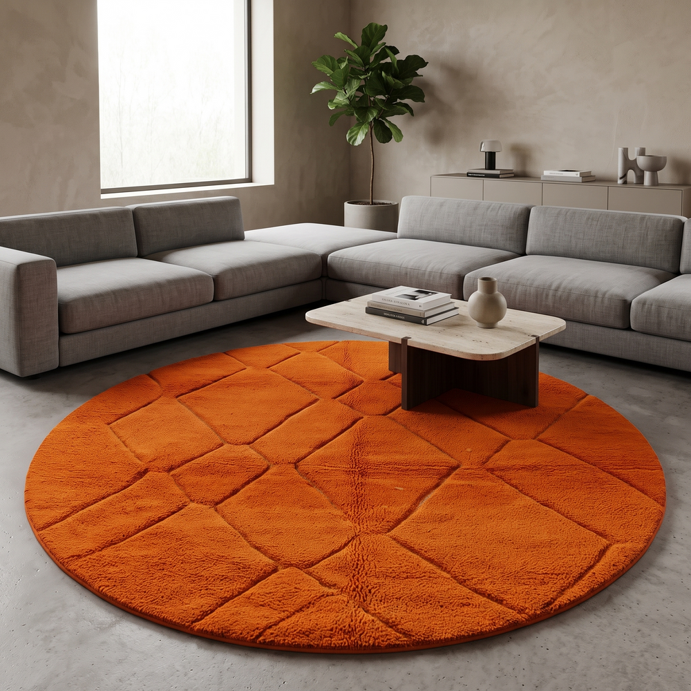 Round Moroccan rug in vibrant orange wool with carved diamond geometric pattern, handmade