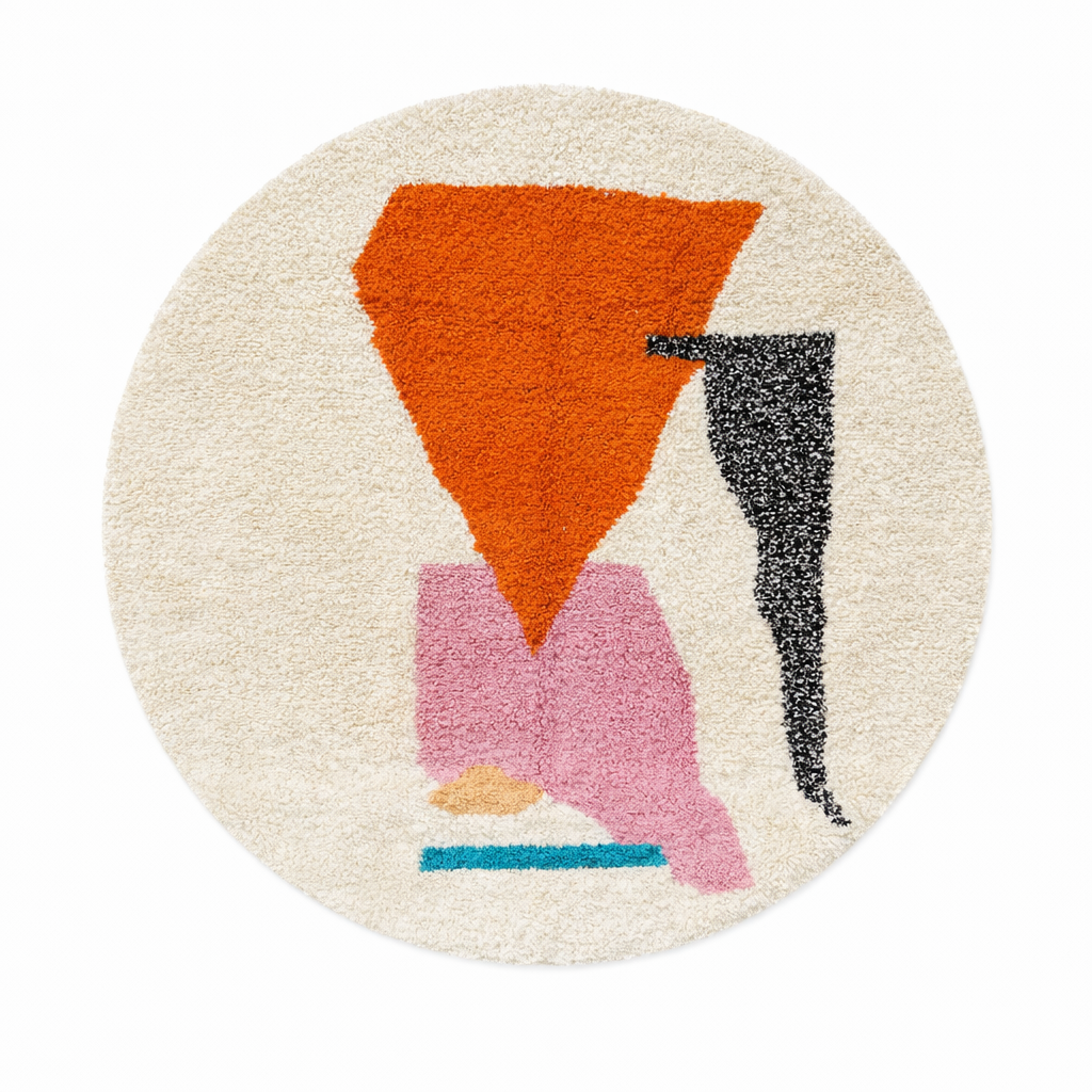 Handmade round Moroccan wool rug with abstract modern design on an white base, featuring orange, black, pink, teal, and beige shapes.