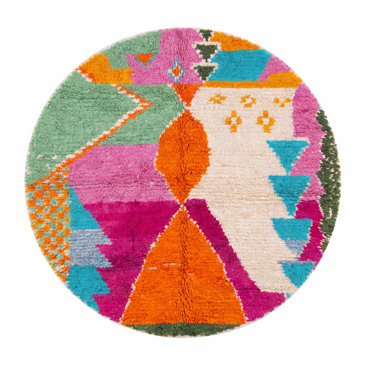 Colorful round Moroccan wool rug with abstract orange, pink, turquoise, mint green, and ivory geometric patterns.