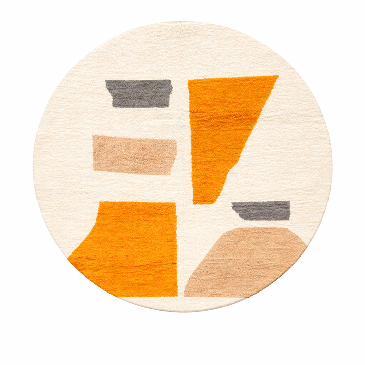 Round Moroccan wool rug with modern abstract Berber design in earth tones