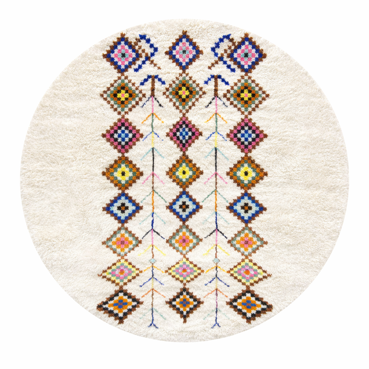 Round Moroccan wool rug with colorful Berber diamond patterns on an white background