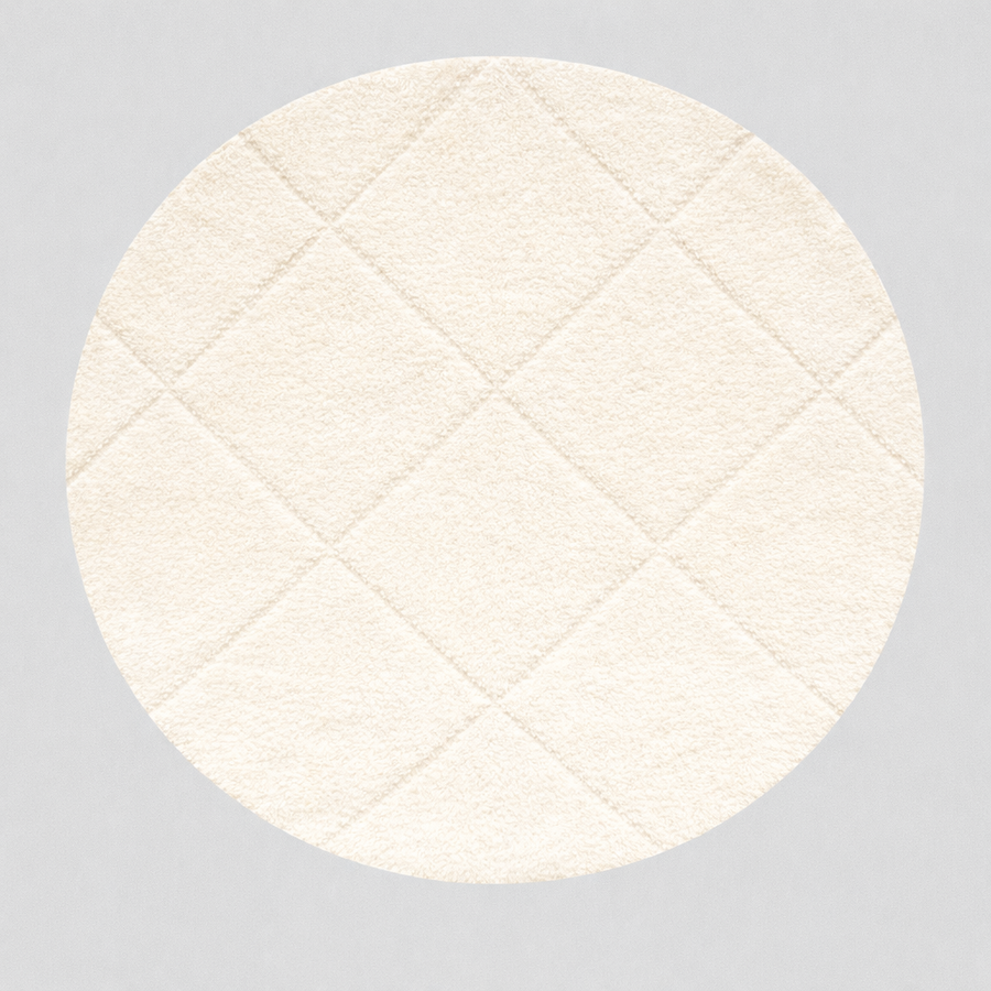 Round Moroccan wool rug with white color and hand-carved diamond lines