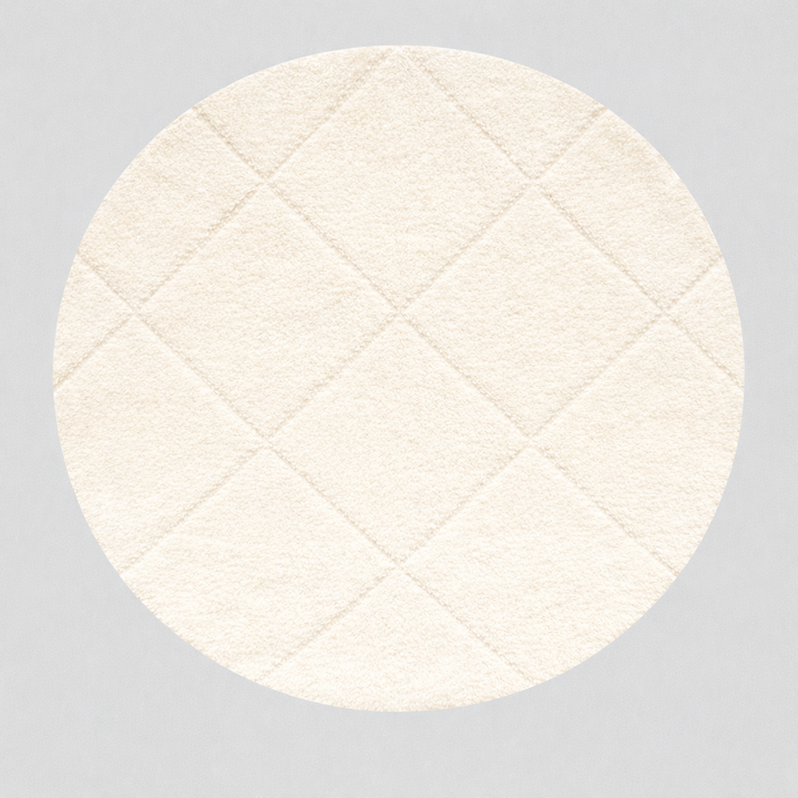 Round Moroccan wool rug with white color and hand-carved diamond lines