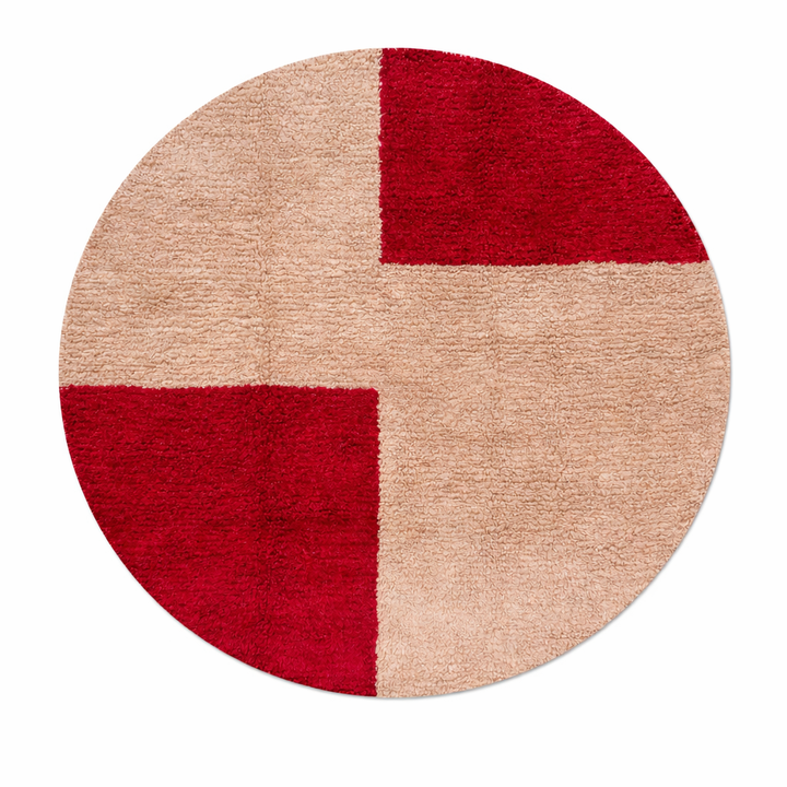 Handmade round Moroccan wool rug in red and beige color-block design