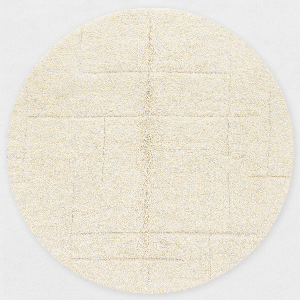 Round white Moroccan wool rug with subtle carved geometric line pattern