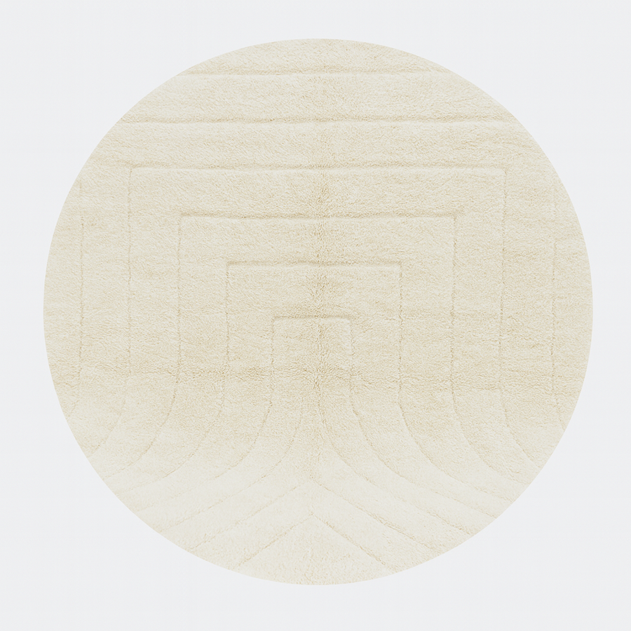 Round white Moroccan wool rug with subtle carved geometric line pattern