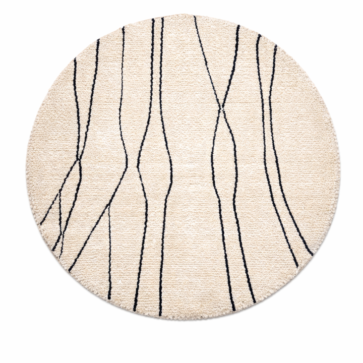Round white Moroccan wool rug with minimalist black Berber lines, handmade artisan round rug on white background