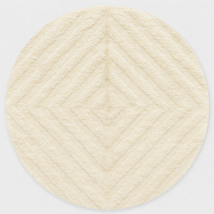 Round white Moroccan wool shag rug with minimalist solid design