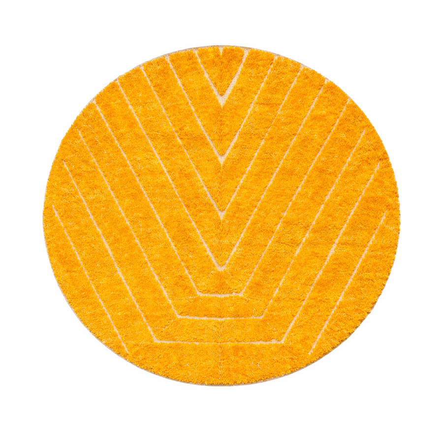 Round handmade Moroccan wool rug in golden yellow with chevron pattern