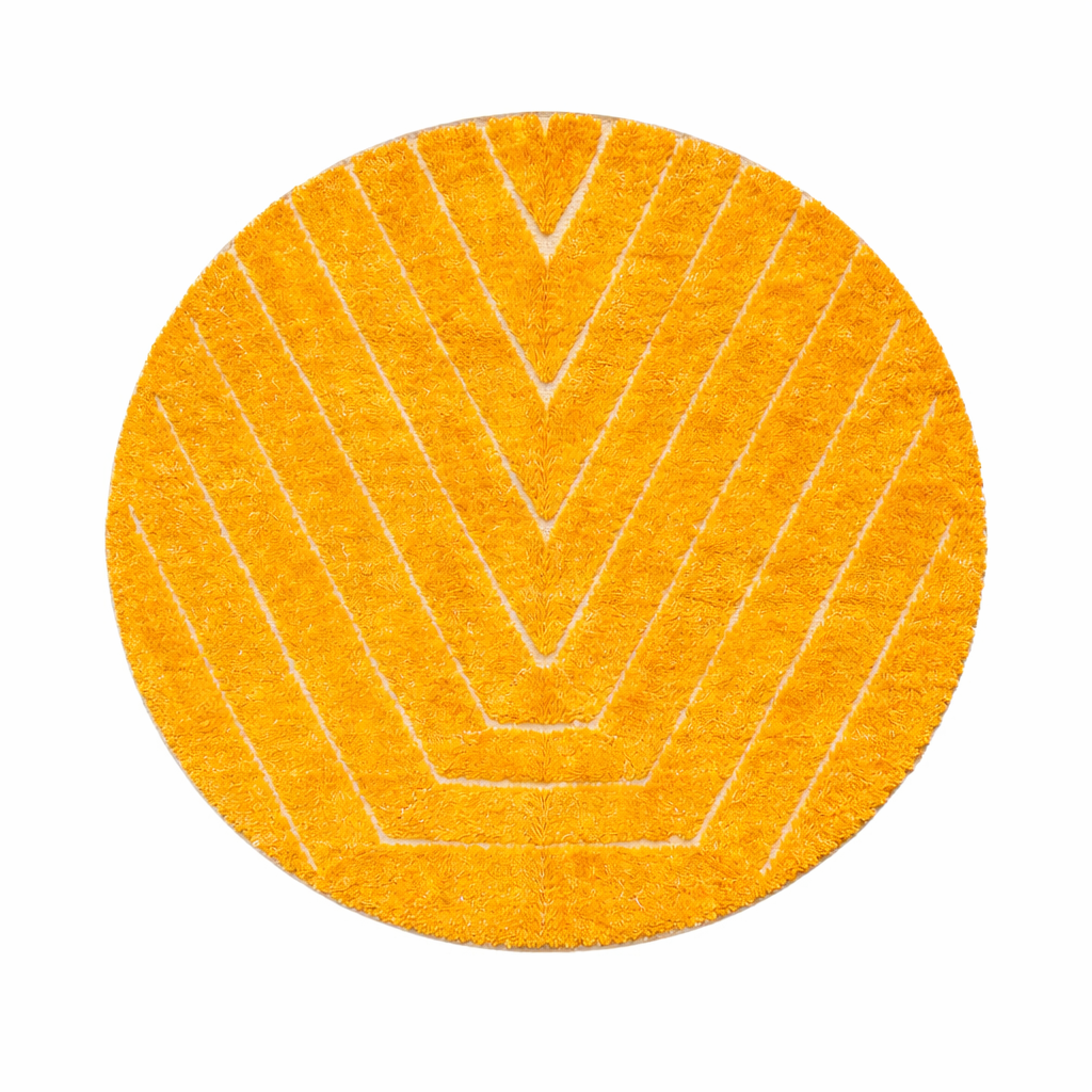 Round handmade Moroccan wool rug in golden yellow with chevron pattern