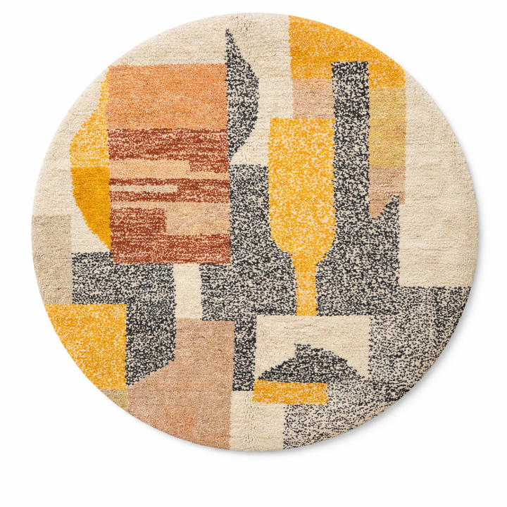 Round abstract Moroccan wool rug with geometric blocks in mustard, terracotta, ivory and charcoal on white background