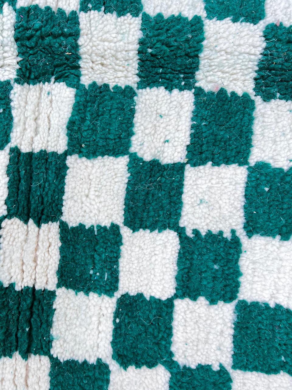 Round green and white checkered Moroccan wool rug, handmade.