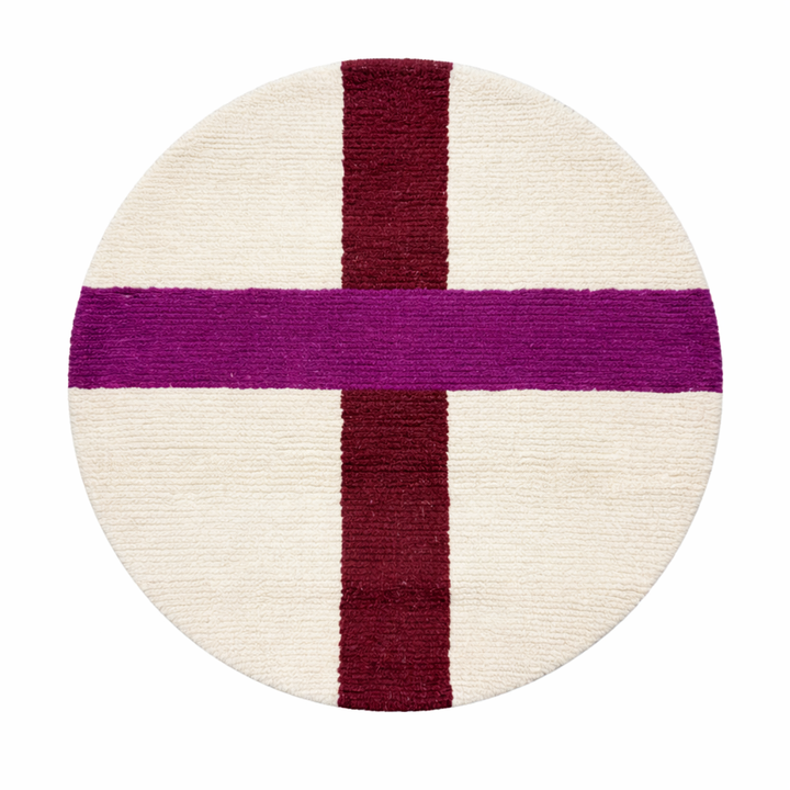 Round cream white Moroccan wool rug with burgundy and purple cross pattern
