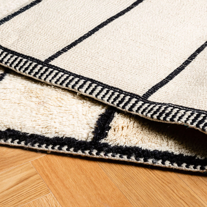 Striped Moroccan Wool Rug – Modern Black Lines on Ivory Base