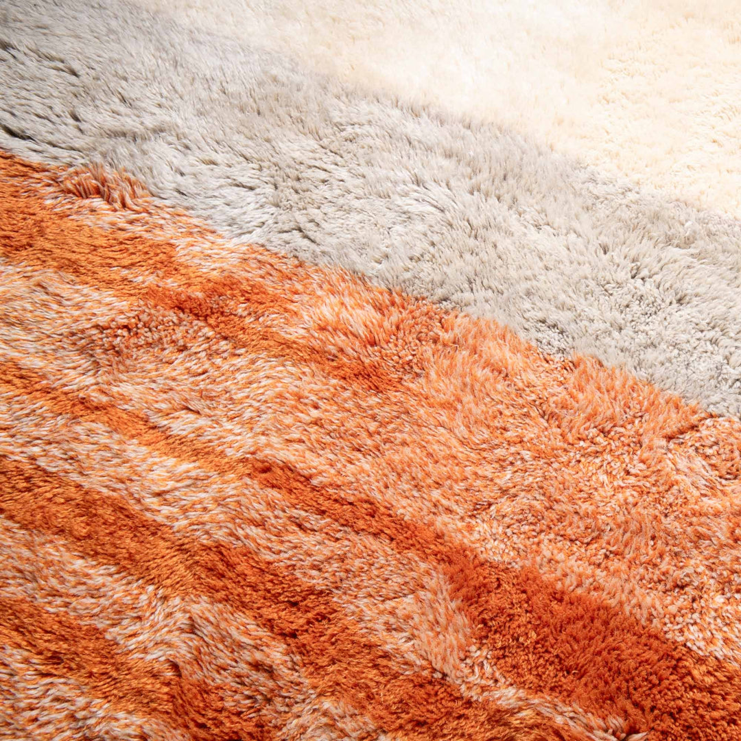 Handmade Sunrise Beni Mrirt Moroccan wool rug in orange and ivory hues; traditional Berber carpet, area rug from Morocco.