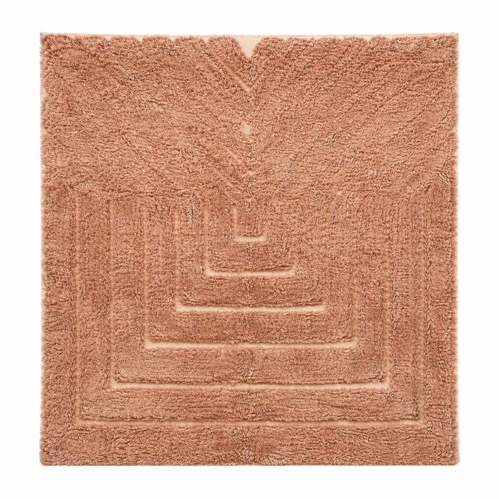 terracotta moroccan wool rug with sculpted carved line design