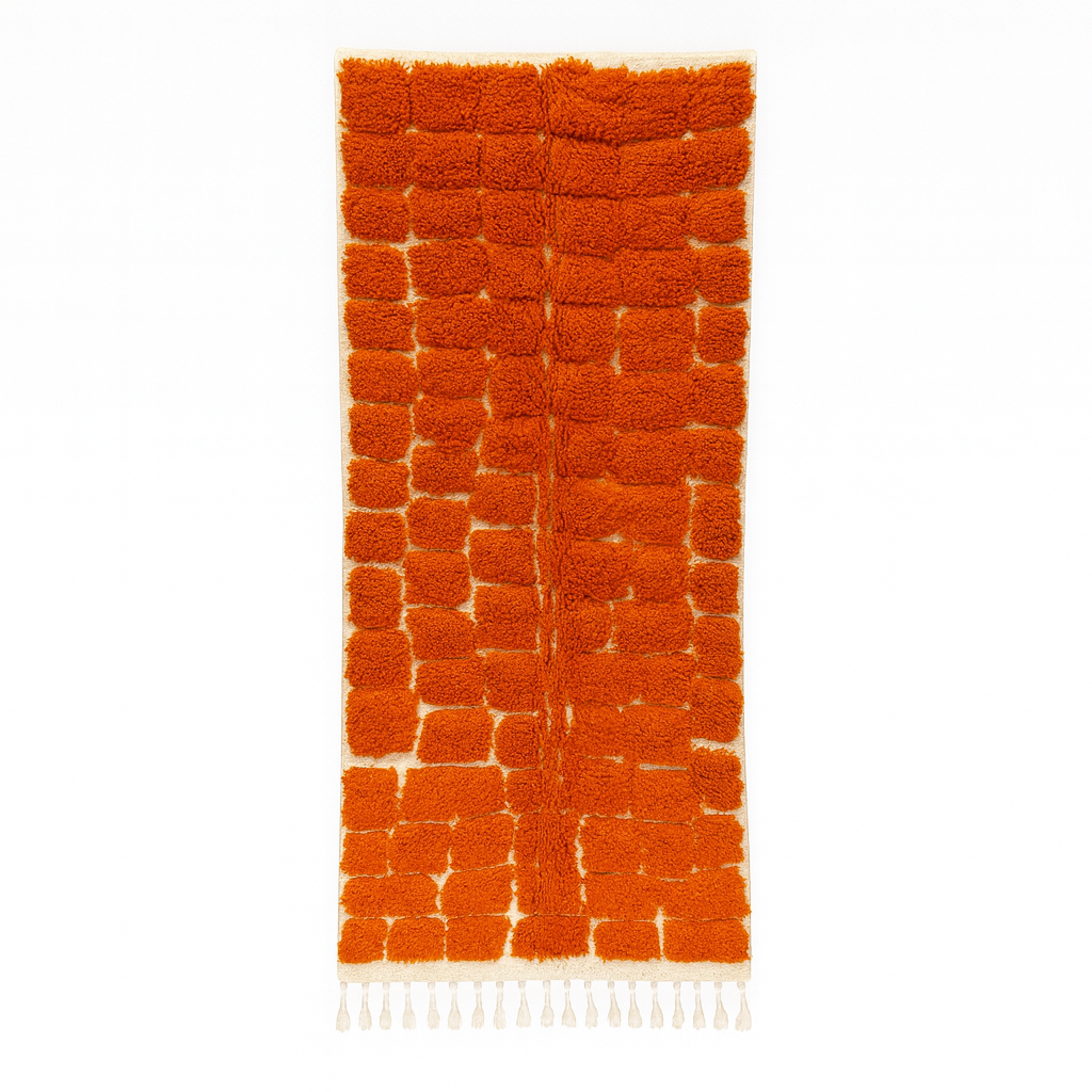 Handmade orange Moroccan runner rug with textured geometric pattern in natural wool, ideal for hallway and modern boho interiors.