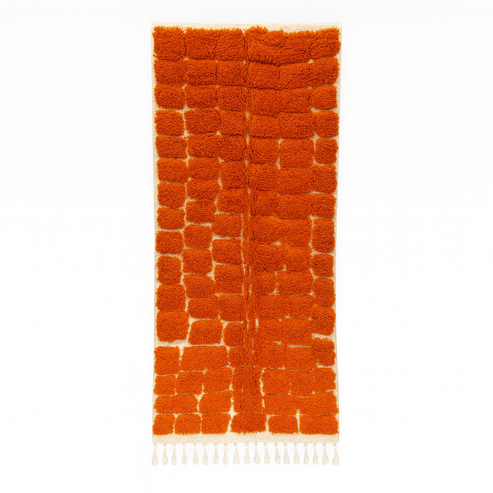 Handmade orange Moroccan runner rug with textured geometric pattern in natural wool, ideal for hallway and modern boho interiors.