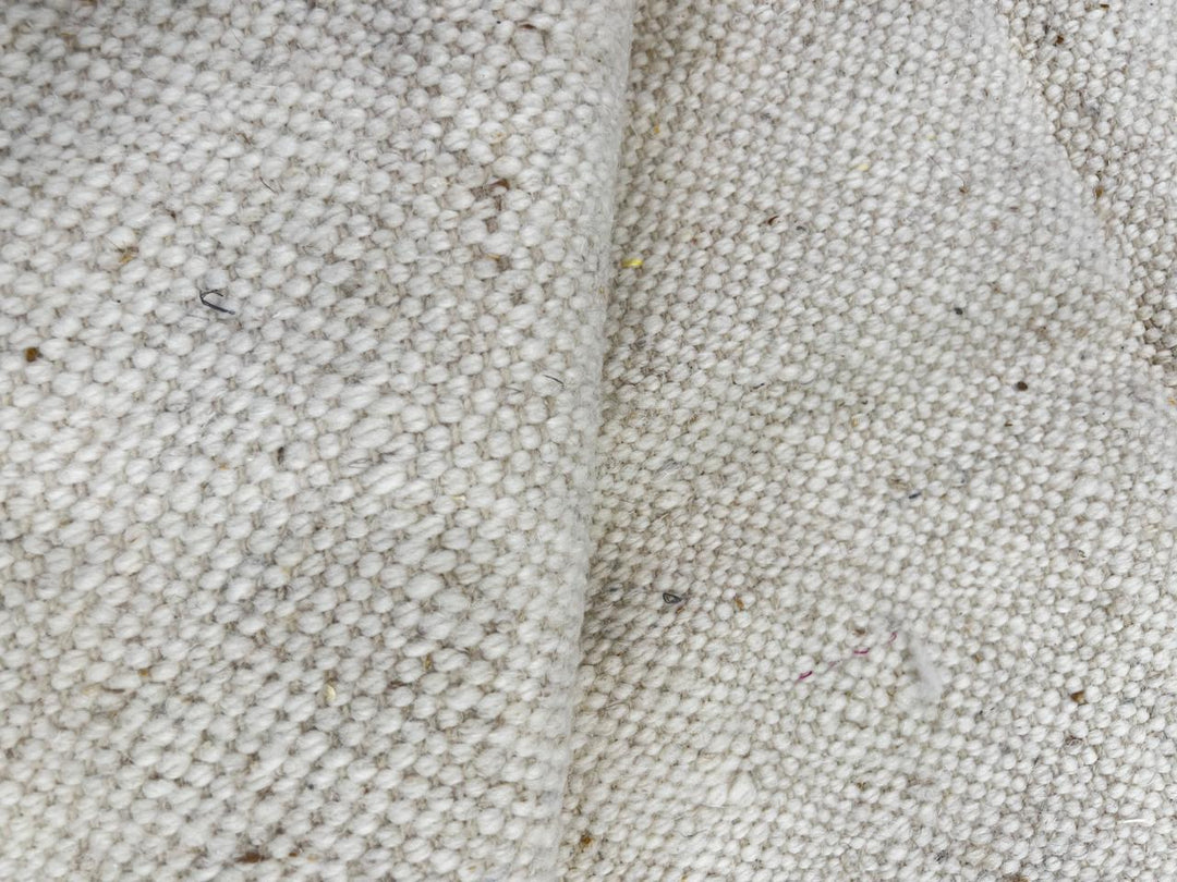 Turquoise and black Moroccan runner rug with abstract geometric pattern on ivory wool, handmade Berber design