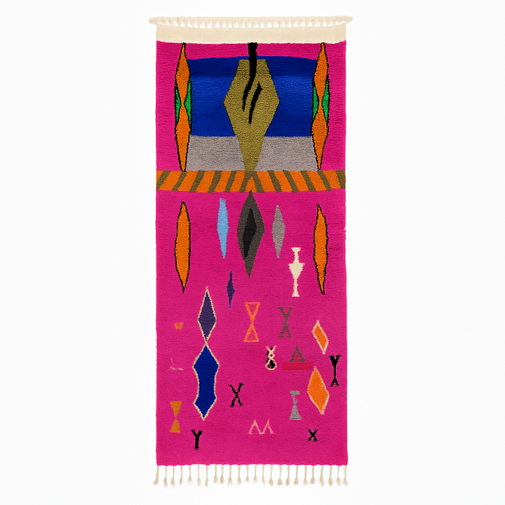 Handmade vibrant pink Moroccan wool runner rug with colorful tribal Berber motifs