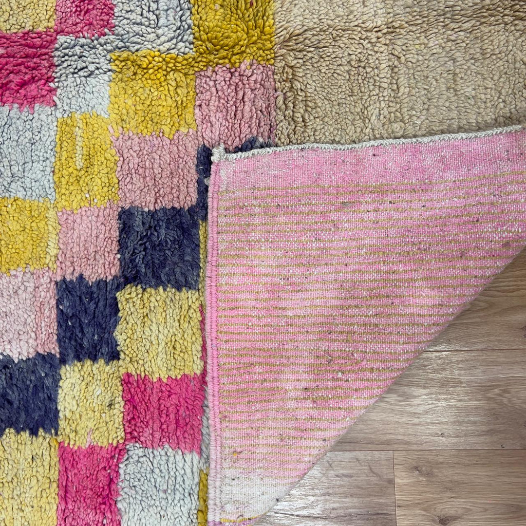 Handmade Moroccan Berber rug 170 in pink and yellow tones, abstract wool carpet with geometric patterns and plush shag texture