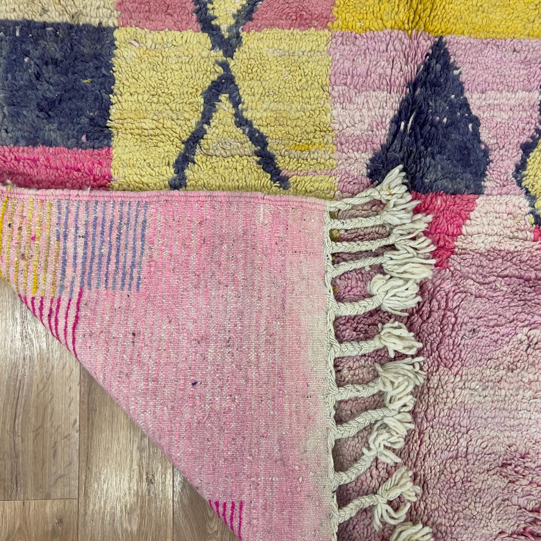 Handmade Moroccan Berber rug 170 in pink and yellow tones, abstract wool carpet with geometric patterns and plush shag texture