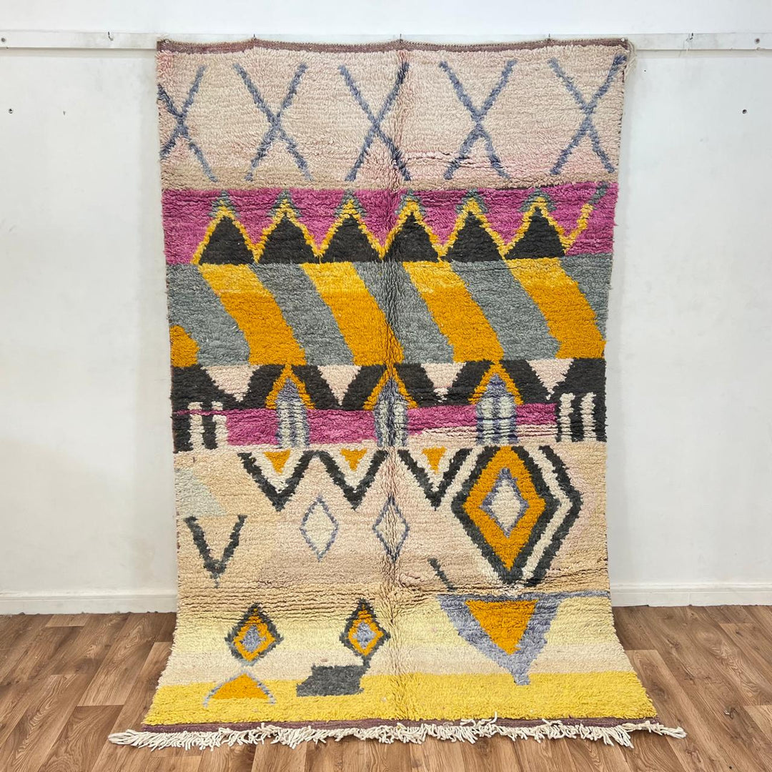 Vintage Moroccan Berber rug in mustard yellow with geometric tribal patterns, handmade wool area rug from Morocco