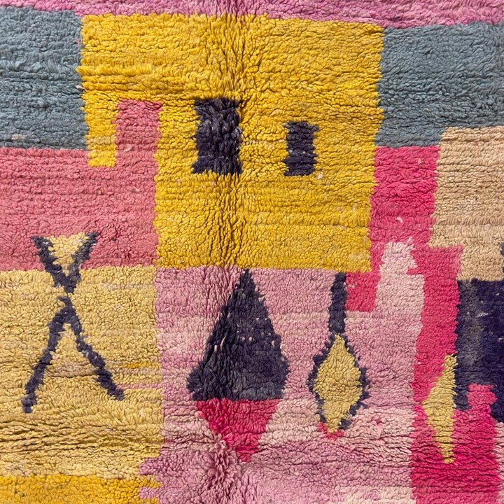 Handmade Moroccan Berber rug 170 in pink and yellow tones, abstract wool carpet with geometric patterns and plush shag texture