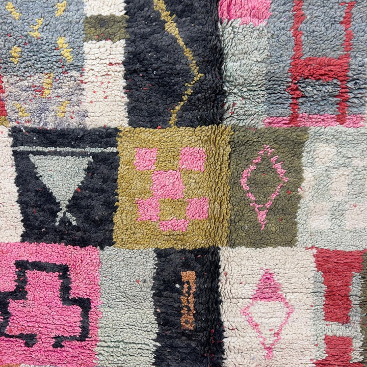 Handmade Moroccan Berber rug 95 with patchwork design in pink, mustard, and neutral tones, wool tribal carpet with geometric symbols
