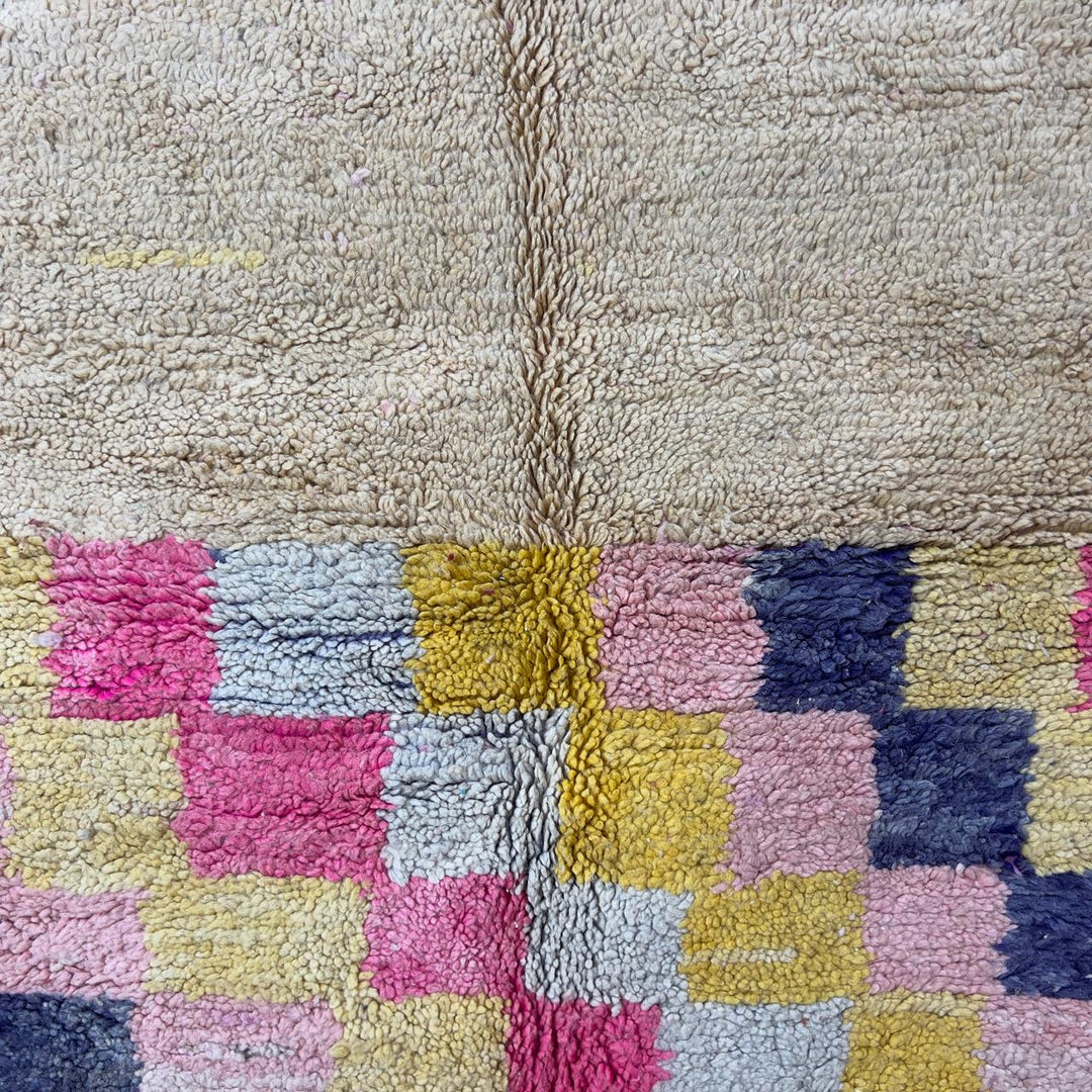 Handmade Moroccan Berber rug 170 in pink and yellow tones, abstract wool carpet with geometric patterns and plush shag texture