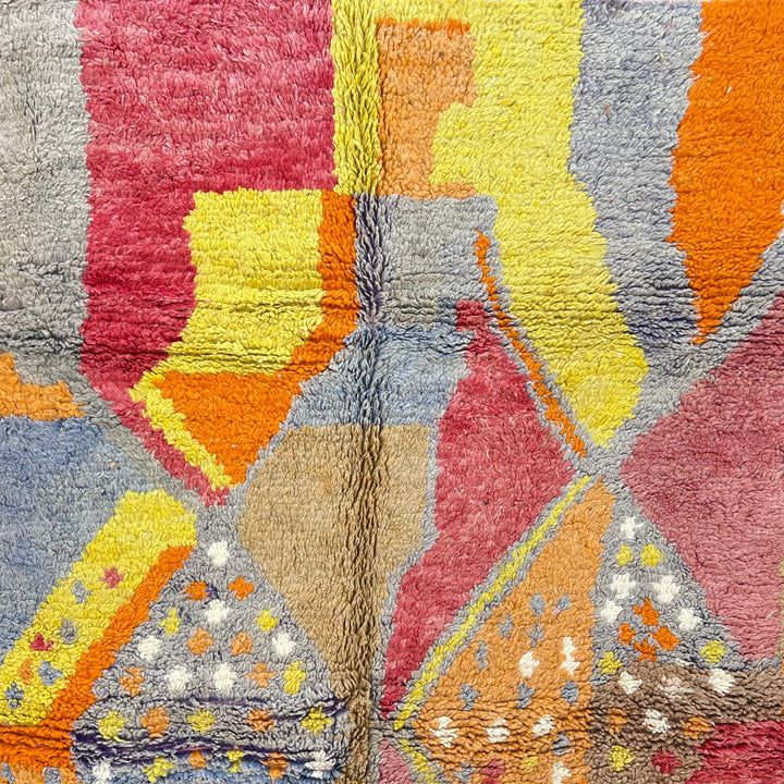 Vintage Moroccan wool rug with colorful abstract Berber geometric design in pink, yellow, grey and beige, handmade in Morocco, size 252x179 cm