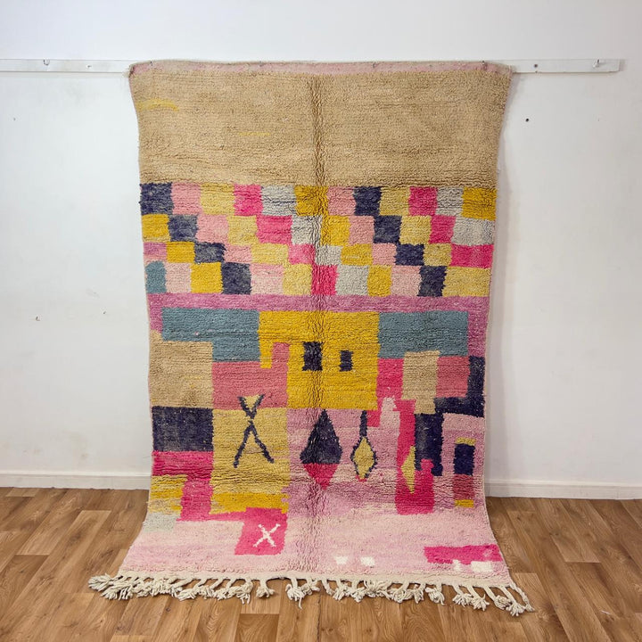 Handmade Moroccan Berber rug 170 in pink and yellow tones, abstract wool carpet with geometric patterns and plush shag texture