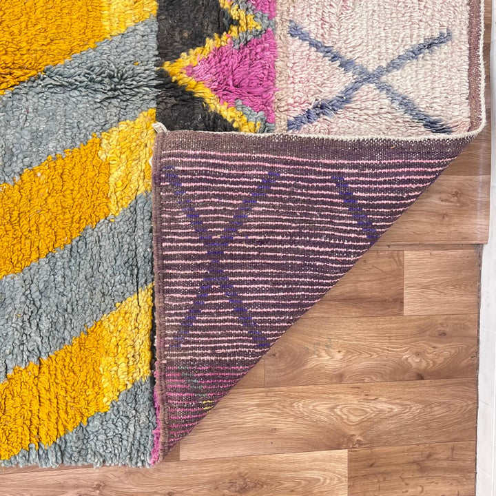 Vintage Moroccan Berber rug in mustard yellow with geometric tribal patterns, handmade wool area rug from Morocco