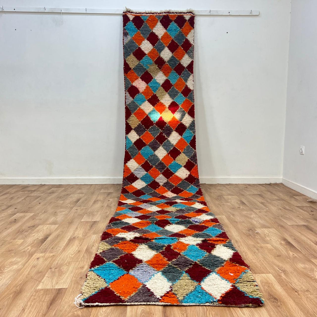 Vintage Moroccan wool runner rug 822 – handmade diamond-patterned Berber carpet in orange, turquoise, and red 407 × 83 cm (13.35 × 2.72 ft
