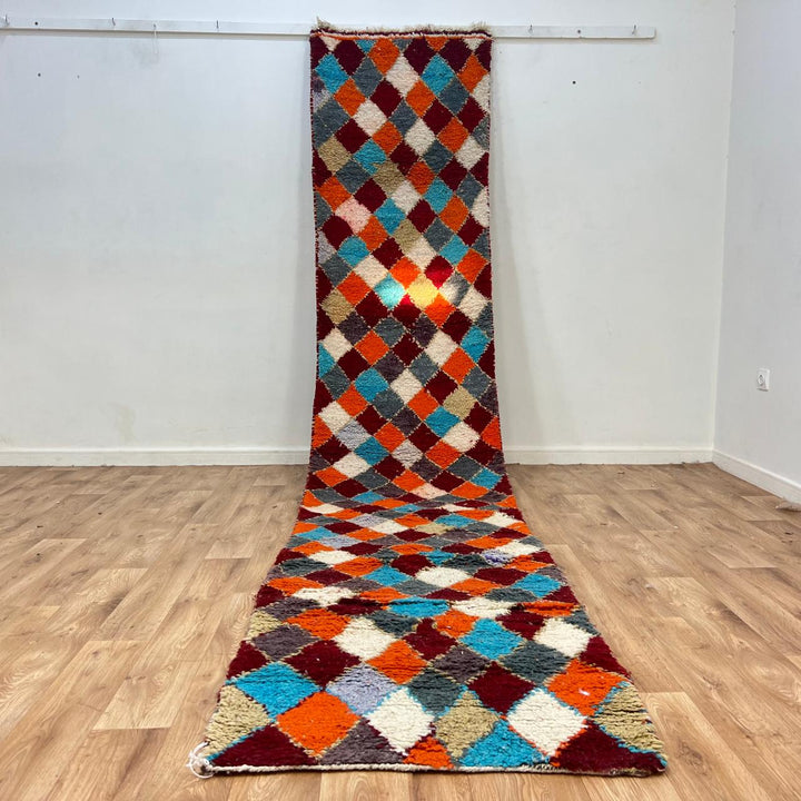 Vintage Moroccan wool runner rug 822 – handmade diamond-patterned Berber carpet in orange, turquoise, and red 407 × 83 cm (13.35 × 2.72 ft