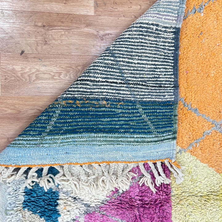 Vintage Moroccan wool rug 755 – handmade colorful geometric Berber carpet with fuchsia, orange, teal, and yellow tones, 252 × 166 cm (8.26 × 5.44 ft).