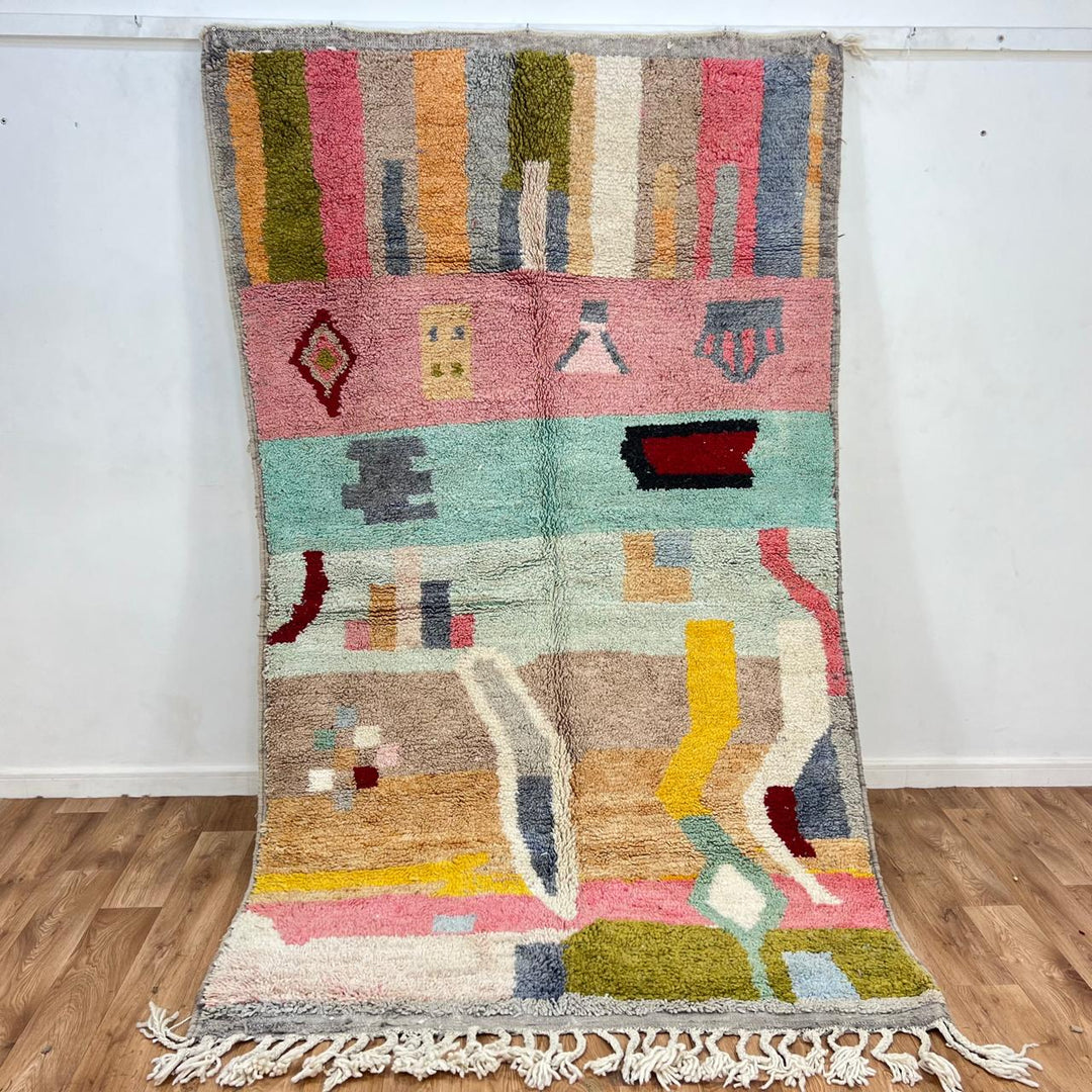 Vintage Moroccan wool rug 761 – handmade colorful Berber carpet with geometric abstract design in pink, turquoise, mustard, and beige tones, 260 × 151 cm.