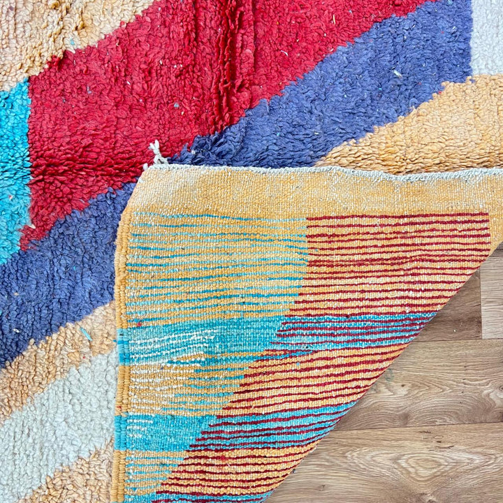 Vintage Moroccan wool rug 813 – handwoven Berber carpet featuring orange, red, turquoise and cream abstract patterns, 264 × 148 cm (8.66 × 4.85 ft).